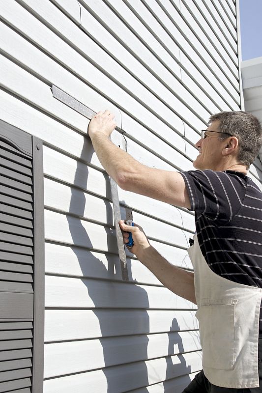 Professional Installing Vinyl Siding